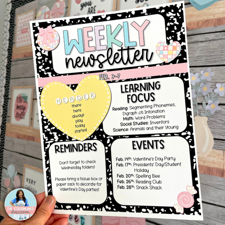 A detailed view of the weekly newsletter template being held up in a decorated classroom. The layout features sections for learning focus, reminders, and events, with a pastel-colored Valentine's theme. The template has editable headers and text boxes, allowing teachers to personalize their updates.