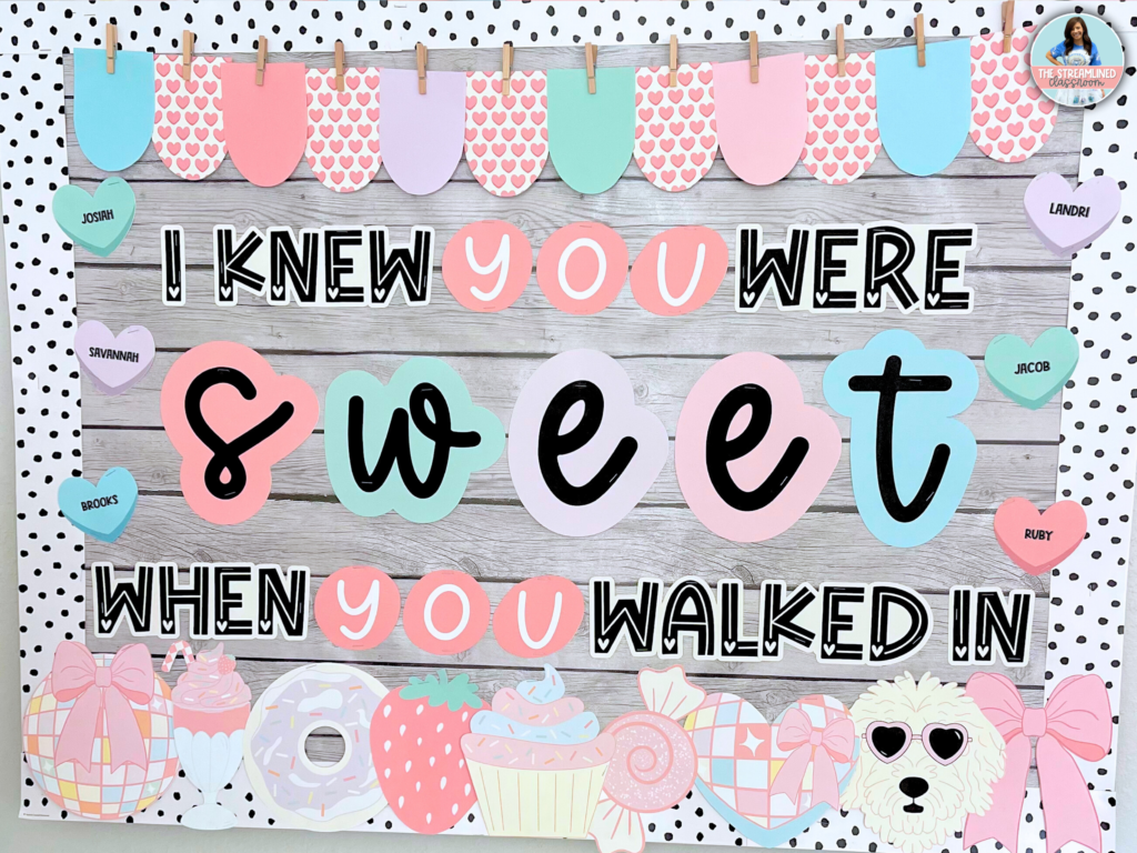 A full view of a classroom door or bulletin board decorated with the Valentine’s Day kit, featuring candy hearts, student names, decorative pennants, and sweet-themed clipart. The phrase "I Knew You Were Sweet When You Walked In" is the centerpiece, making it a perfect Taylor Swift-inspired classroom display.