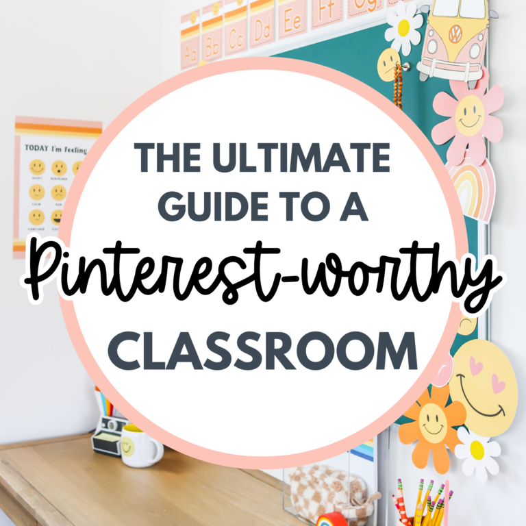 A bright and colorful classroom featuring a teal bulletin board decorated with smiley faces, rainbows, and retro-inspired decor. The desk area includes a lava lamp, a small potted plant, and rainbow-themed stationery. A large white circle overlay with bold text reads: "The Ultimate Guide to a Pinterest-Worthy Classroom," with a stylish mix of script and block fonts. The pin has a fun, inviting aesthetic perfect for teachers looking for classroom decor inspiration.
