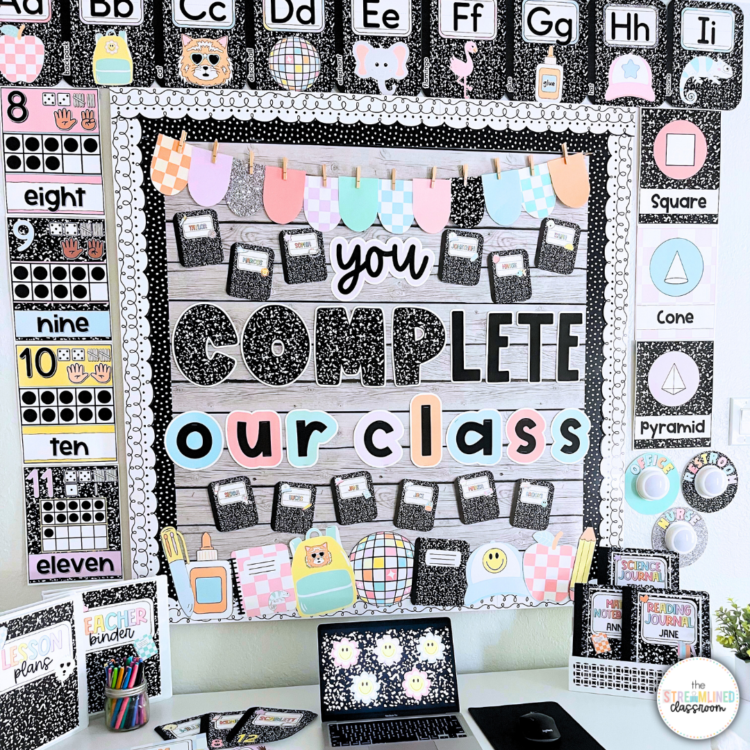 “You Complete Our Class” bulletin board display in pastel and black-and-white, surrounded by alphabet cards, shapes, and number posters with trendy 90s-style decor.