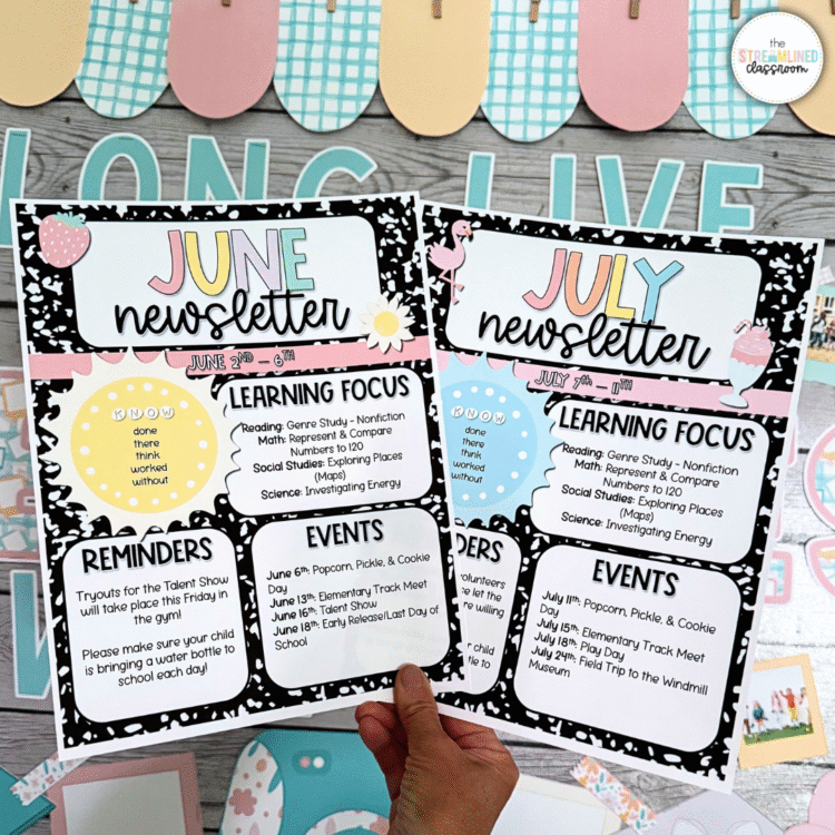Hand holding printed June and July classroom newsletters in front of a popsicle-themed classroom bulletin board. The newsletters use a pastel composition notebook theme and include sections for learning focus, reminders, and classroom events.